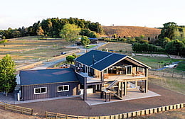 Aerial shot of country home facing the entertaining decks