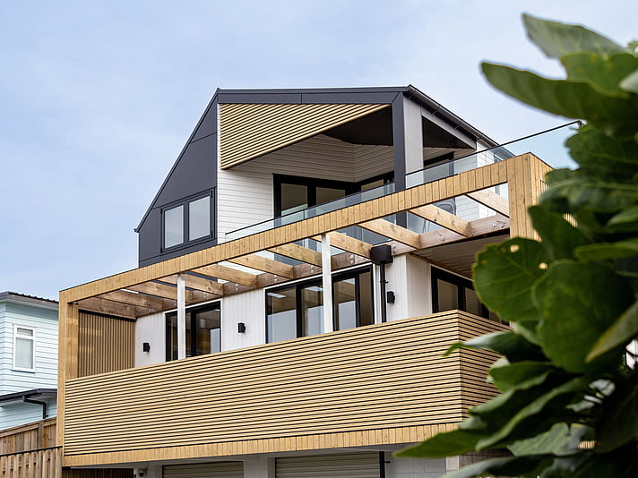 The project cover image shows a full home renovation of a three-story modern home in Papamoa, completed by Straight Up Builders Tauranga. 