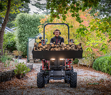 Massey Ferguson 1GC Compact Tractor  moving a load