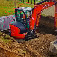 Drainpro digger prepping site