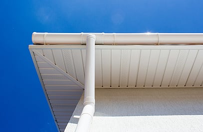 Photo of spout and piping on a house