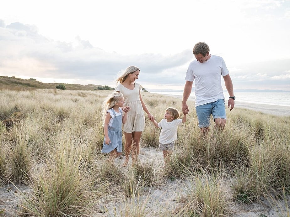 Tauranga Photographer.  Family on the beach in the sand dunes.  Jackie O'Photography.  Papamoa Family Photographer.