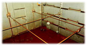 before pictures of a rusted tank interior 