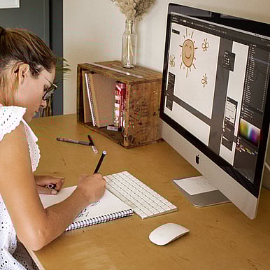 The Journal: Design processes + more. Photo at a computer, sketching and drawing