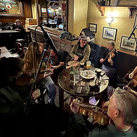 Playing violin live in Queenstown.