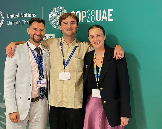 Three Kiwis in Climate members networking at COP28