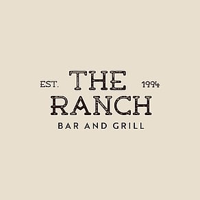 The Ranch logo in brown over a light tan background.
