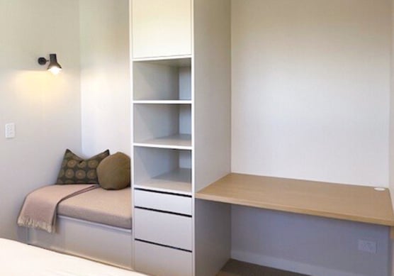 fitted bedroom nursery wardrobe with desk.