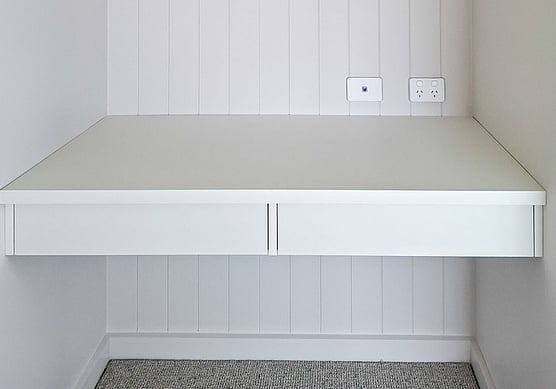 Customised study desk to fit bedroom alcove.