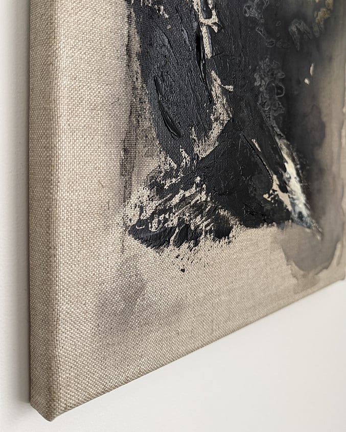 Side view of canvas showing linen edge, surface depth and material build-up.