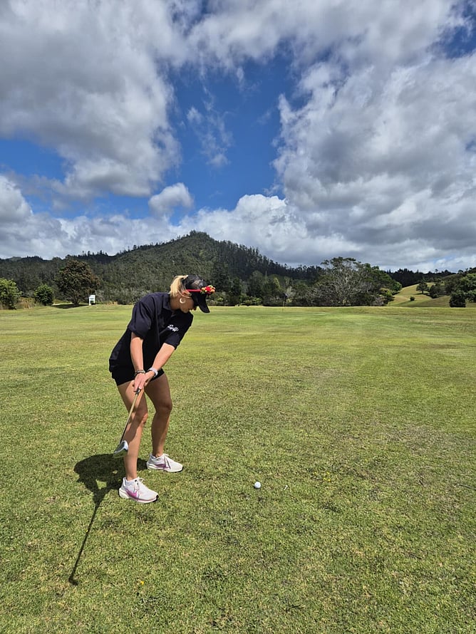 Jacqui Gage-Brown on the golf course — deliberate strategy before every shot, just like making the right marketing hire