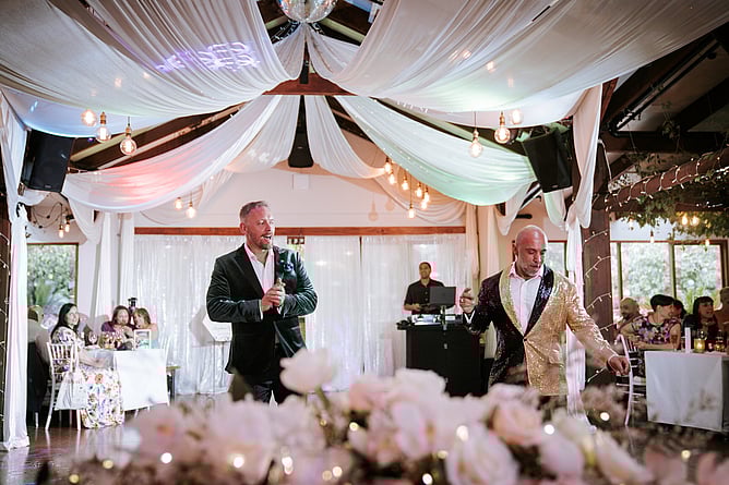 Same-sex wedding reception entrance at Markovina Estate in Kumeu
