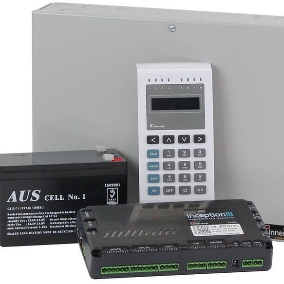 A picture of an alarm kit. Shows alarm panel,  external panel, battery and control box.