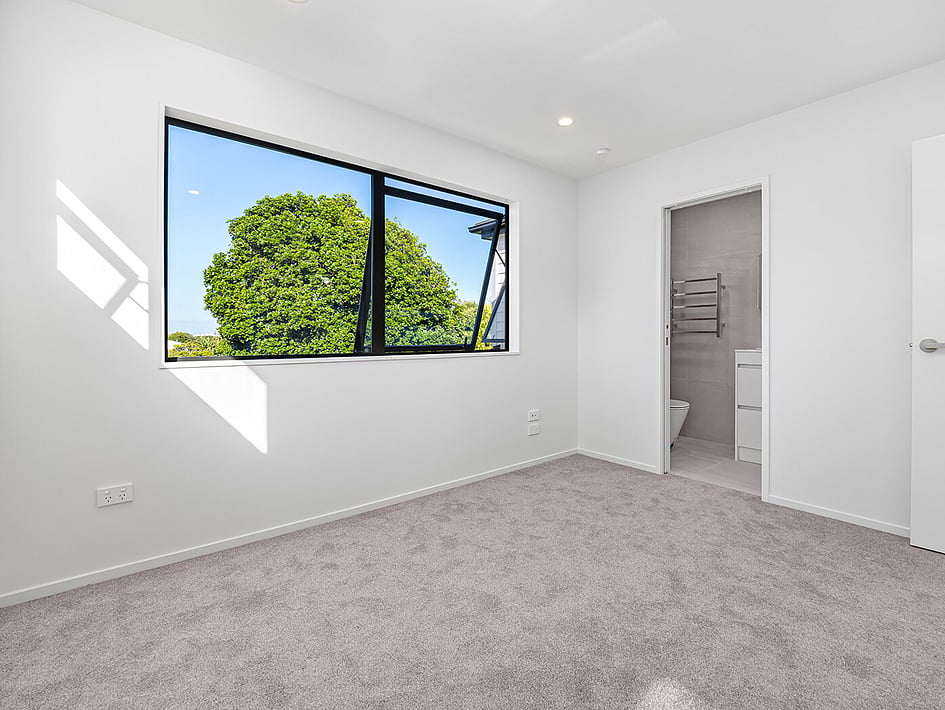 New neutral bedroom in Eden Construction&rsquo;s new build house on Mountain Road, Mangere Bridge, Auckland.