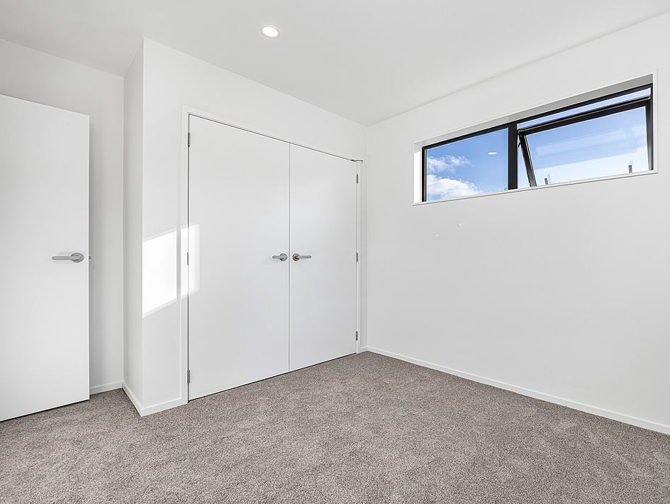 New neutral bedroom in Eden Construction&rsquo;s new build house on Mountain Road, Mangere Bridge, Auckland.