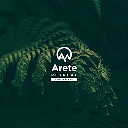 Arete Logo on a photograph of a fern