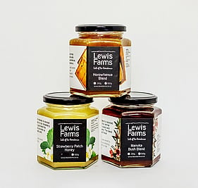 three jars of Lewis Farm honey products
