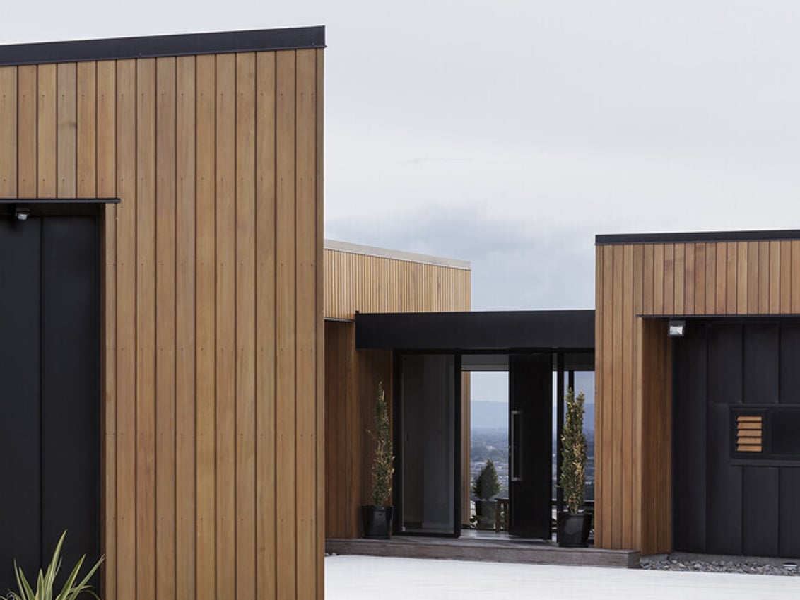 award winning cedar and iron house on a hilltop