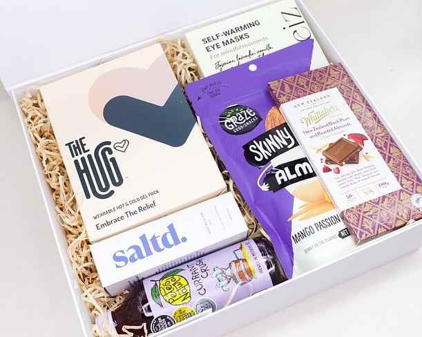 NZ DESIGNED HEAT PACK, MAGNESIUM, CHOCOLATES AND A NZ MADE JUICE