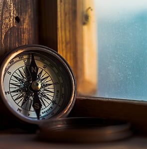 Compass representing focused governance direction, highlighting GGA's commitment to guiding better board performance through the merger of Westlake Governance and Peakstone Global.