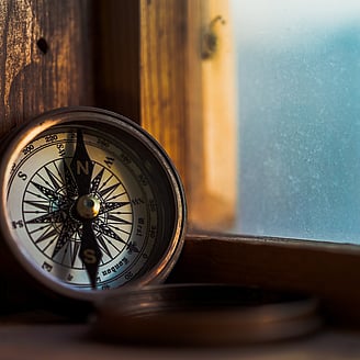 Compass representing focused governance direction, highlighting GGA's commitment to guiding better board performance through the merger of Westlake Governance and Peakstone Global.