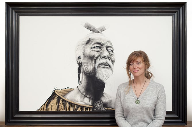 Sofia Minson standing before Ranginui original painting in her New Zealand studio, large scale Māori-inspired artwork available for private collection