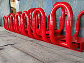 Red powder coated cycle stands for Hamilton City Council