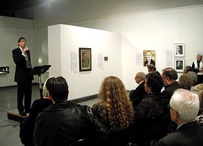 Portrait Gallery trustee Keith Ovenden welcomes visitors