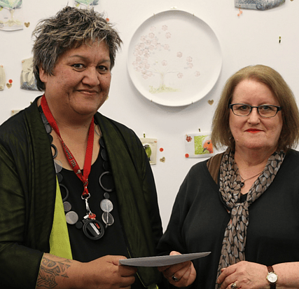 Ruahine Albert CEO Whakaruruhau Women&rsquo;s Refuge, Dorothy Gilson, Trust Chair receiving donation from the Trust to support their child services.