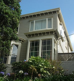 Exterior painting of a commercial and residential character property