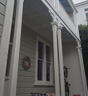 Exterior house restoration and painting of a 2 storey iconic bungalow