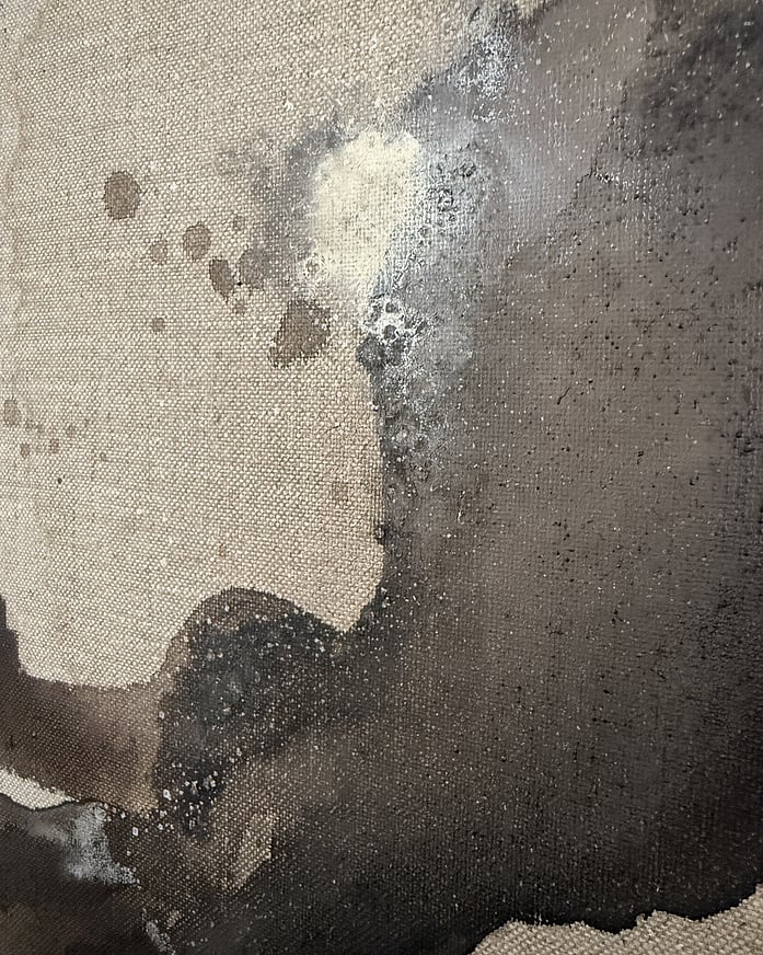 detail of acrylic on linen, cream bloom with salt-induced erosion forming granular texture, pale brown wash and layered brown pigment