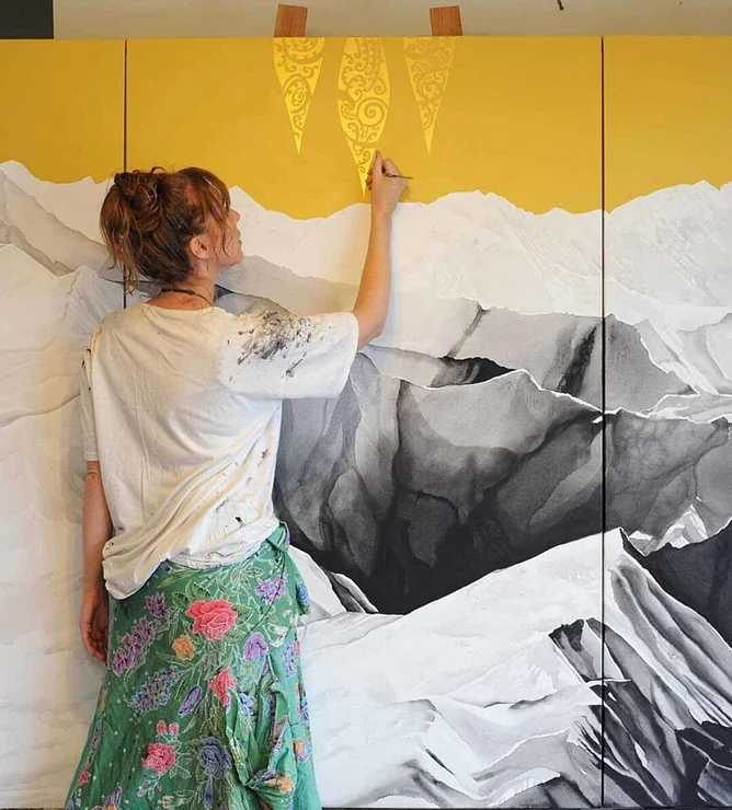 Sofia Minson painting Te Waka a Māui in her studio, creating the three metre wide original triptych in flashe and acrylic on canvas, New Zealand artist at work