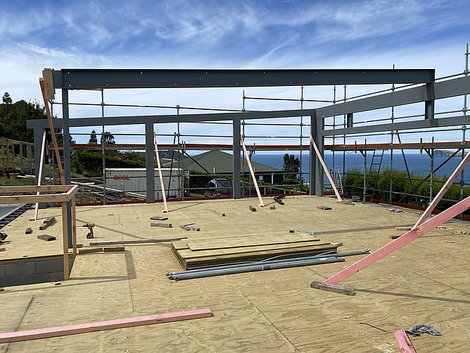 Structural steel hillside build Paku Tairua  with Taylors