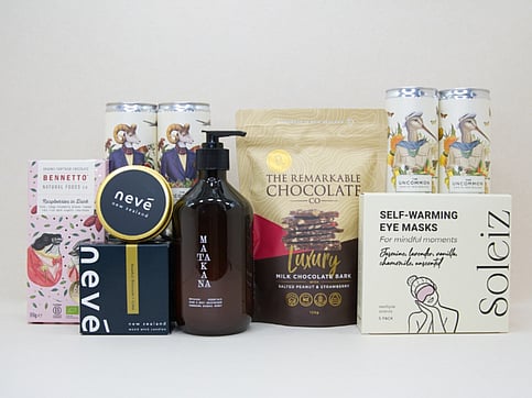 UNCOMMON WINE CANS, SOLEIZ EYE MASKS, BENETTO CHOCOLATE AND NEVE CANDLE