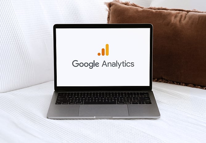 Laptop computer with Google Analytics logo on screen
